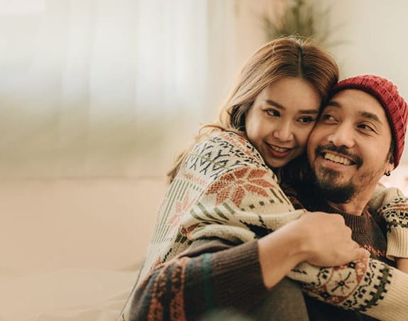 A father with his young daughter.